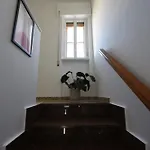 Ar *
