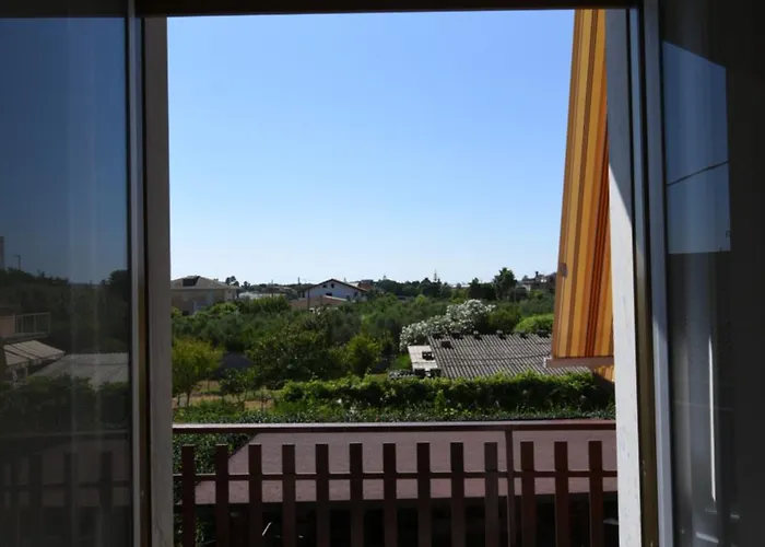 Ar Casa de Férias *